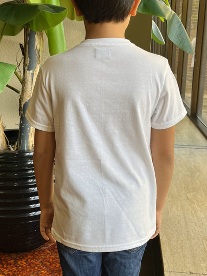 Back view of a boy wearing a white t-shirt